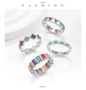 Close-up of S925 silver rings set featuring colorful heart and floral gemstones