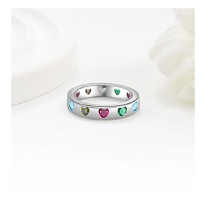 Detailed close-up of S925 silver eternity ring with colorful heart-shaped gemstones