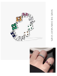 Macro shot of S925 sterling silver ring with colorful stones and S925 hallmark stamp