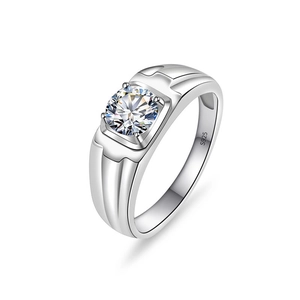 Macro shot of S925 sterling silver stamp and round moissanite on men's wide ring