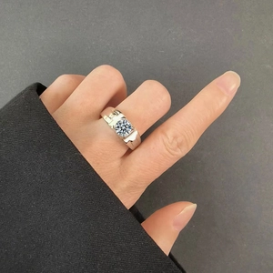 Detailed view of men's S925 silver ring with a sparkling round moissanite stone