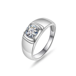Macro shot of S925 sterling silver men's ring showing round moissanite in 4-prong setting