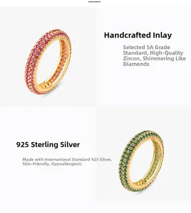 Detailed macro of S925 sterling silver band with hand-set emerald and pink zirconias