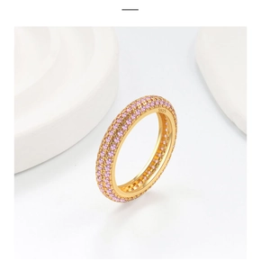 Close-up of S925 sterling silver ring featuring three rows of pave pink zircons