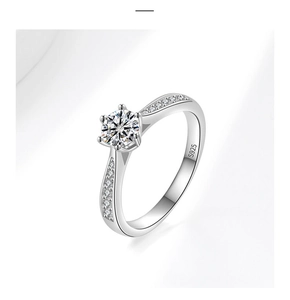 Detailed close-up of S925 sterling silver ring with six-prong moissanite setting