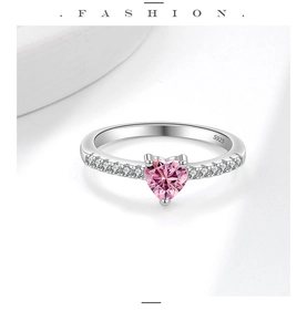Detailed macro shot of S925 sterling silver hallmark on heart-shaped pink gem ring
