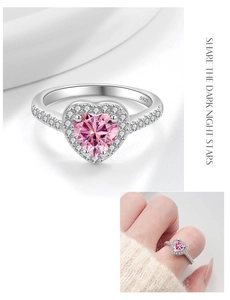 Detailed close-up of a S925 silver ring featuring a pink heart-shaped halo zircon stone