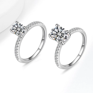 Elegant S925 silver ring set with oval-cut moissanite stone in a classic four-prong setting