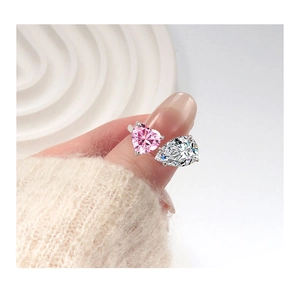 Close-up of S925 silver ring featuring pink heart and pear-cut water drop shaped stones