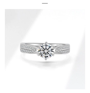 Detailed close-up of S925 sterling silver stamp on a six-prong moissanite ring band