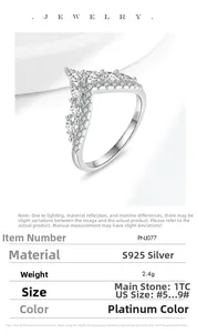 Macro shot of V-shaped S925 sterling silver ring with marquise cut moissanite stones
