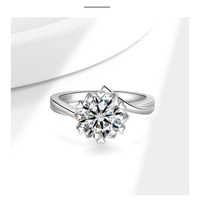 Close-up of S925 sterling silver snowflake ring with brilliant round moissanite