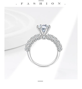 Detail of S925 silver ring with classic six-prong setting and brilliant round center stone