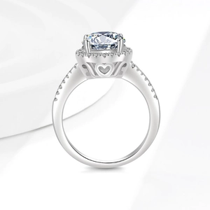 Elegant S925 sterling silver moissanite halo ring featuring a heart-shaped hollow gallery