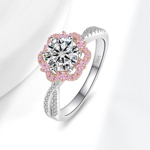 Elegant S925 sterling silver ring with sparkling round moissanite and pink halo accents