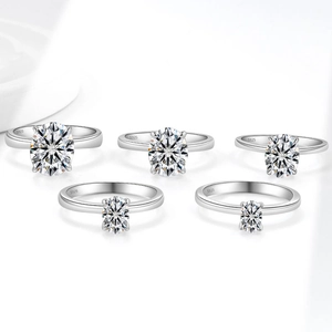 Five oval moissanite S925 sterling silver rings with four-prong settings in sizes