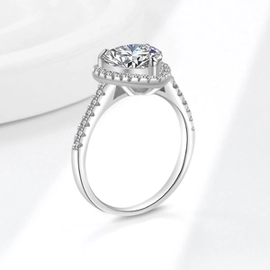 Sparkling S925 silver moissanite ring featuring heart-shaped halo gemstone and pave band