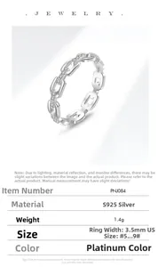 Detail of S925 sterling silver chain ring with pavé diamonds and platinum finish