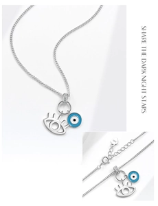 Vue détaillée du pendentif œil maléfique en argent S925 avec émail bleu turquoise
