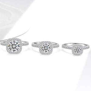 Drei S925 Silber Moissanit Ringe mit Halo-Design und runden Steinen im Brillantschliff