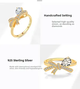 Detalle del anillo de lazo en plata S925 dorada con circonita pera y micropavé de piedras