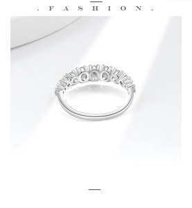 Close-up of minimalist S925 silver ring featuring half-circle pave-set round crystals