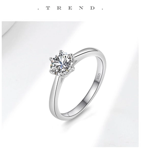 Detailed macro view of S925 sterling silver ring with classic six-prong setting