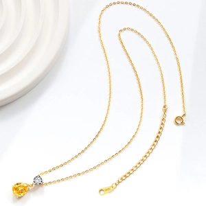 Elegant S925 sterling silver necklace with a yellow pear-cut drop pendant in gold finish