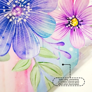 Detail of floral static cling window film with watercolor patterns and rainbow glow effect