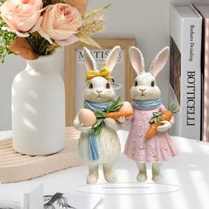 Close-up of 2D flat acrylic Easter bunny ornaments featuring colorful cartoon egg details