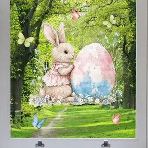 Detail of watercolor Easter bunny and colorful egg sticker on a glass window pane