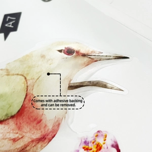 Detalle macro de vinilo decorativo de flores y aves en acuarela con reverso adhesivo