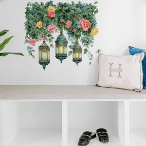 Detailed view of floral wall sticker with watercolor roses and vintage street lanterns