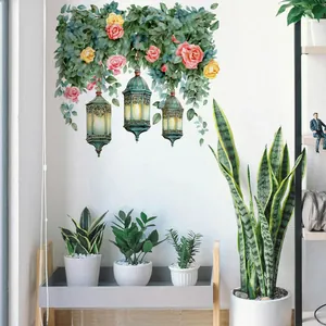 Detailed view of floral watercolor wall stickers with glowing lanterns and pink roses