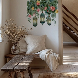 Floral wall decal with vintage lanterns and roses in a cozy living room setting