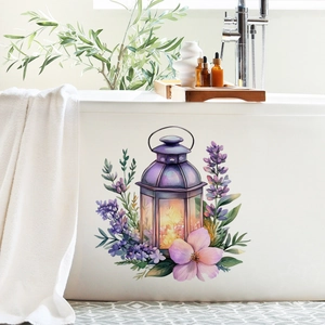 Detailed view of floral lantern wall sticker on a white bathtub in a cozy bathroom