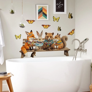 Detail of waterproof forest animals wall stickers featuring fox and bear in bathroom setting