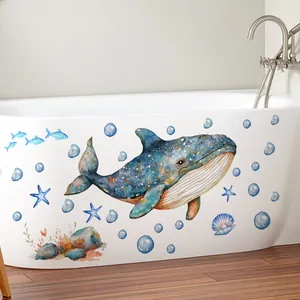 Macro detail of waterproof whale and marine life wall stickers on a bathtub side