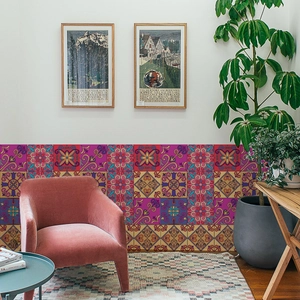Detail of vintage mandala tile stickers with vibrant geometric floral patterns on white wall