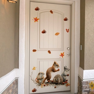 Detailed autumn squirrel and hedgehog wall decals with maple leaves on a white door