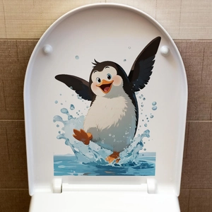 Close-up of cute cartoon penguin sticker on a white toilet lid for bathroom decoration
