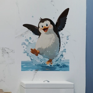 Detail showing a cute cartoon penguin wall sticker on a white marble bathroom wall