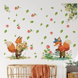 Charming wall stickers with cartoon foxes and flowers in a cozy nursery room setting