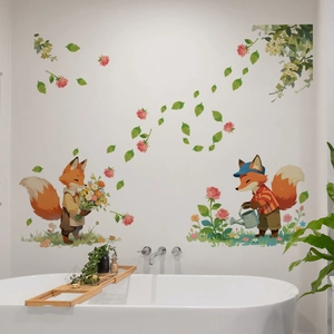 Detail of self-adhesive wall stickers with cartoon foxes and pink floral decorations