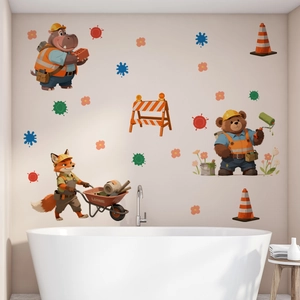 Detailed view of cartoon animal construction workers wall decals in a bathroom setting