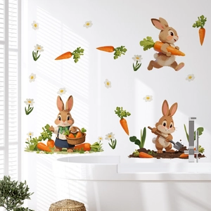 Detail of cartoon bunny wall stickers with carrots on white tiles for kids room