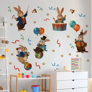 Detailed view of vintage circus rabbits wall stickers applied in a bright nursery setting