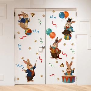 Detail of circus themed rabbit wall stickers with balloons and stars on a white door