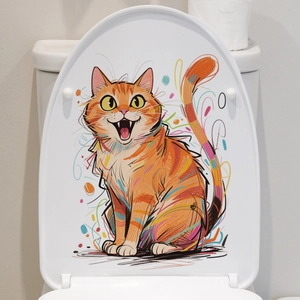 Close-up of decorative toilet seat featuring a vibrant graffiti-style orange tabby cat illustration