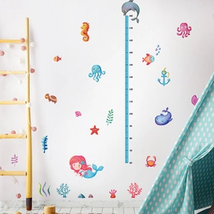 Detailed view of ocean theme height chart sticker with mermaid and dolphin patterns